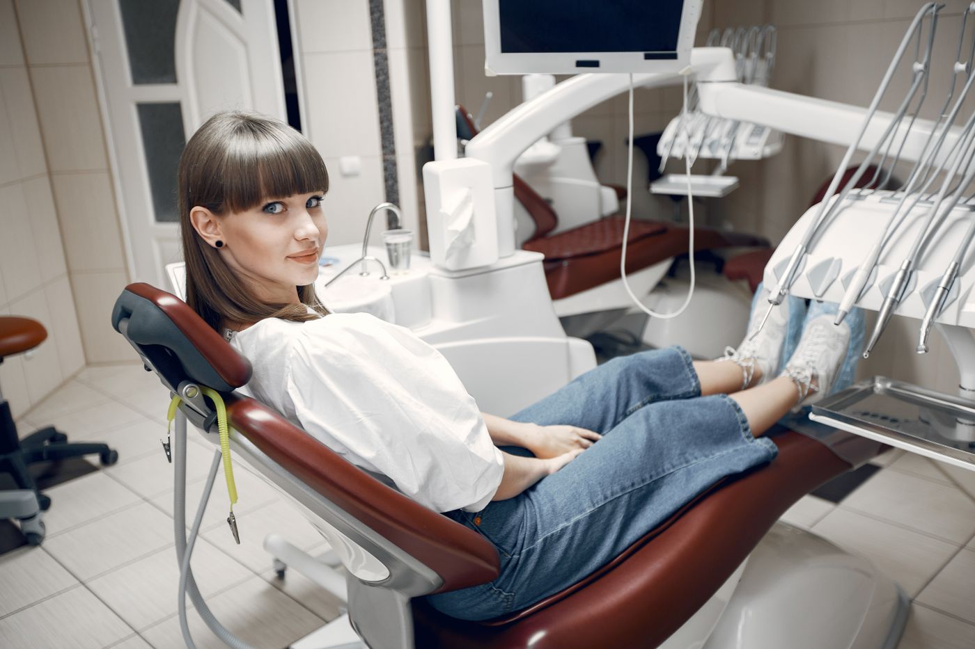 A relaxed patient sitting in a dental chair